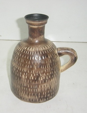 Manufacturers Exporters and Wholesale Suppliers of Iron Bottle W Hammered 10X20 CM Moradabad Uttar Pradesh